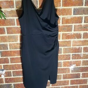 Sleeveless black dress.